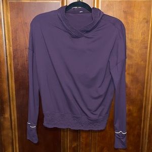 Lululemon Plum hooded top. Size 4. Ruched trim. Back zipped pocket.